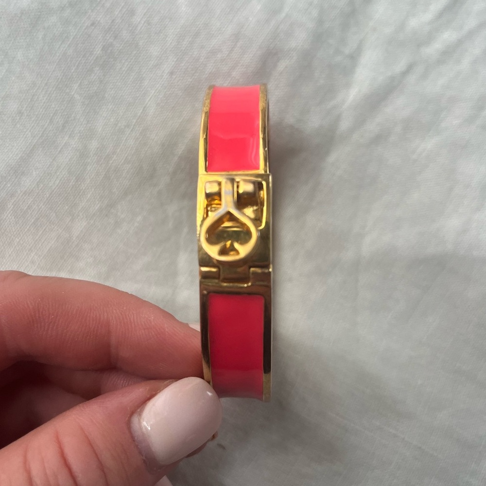 Neon pink Kate Spade cuff bracelet